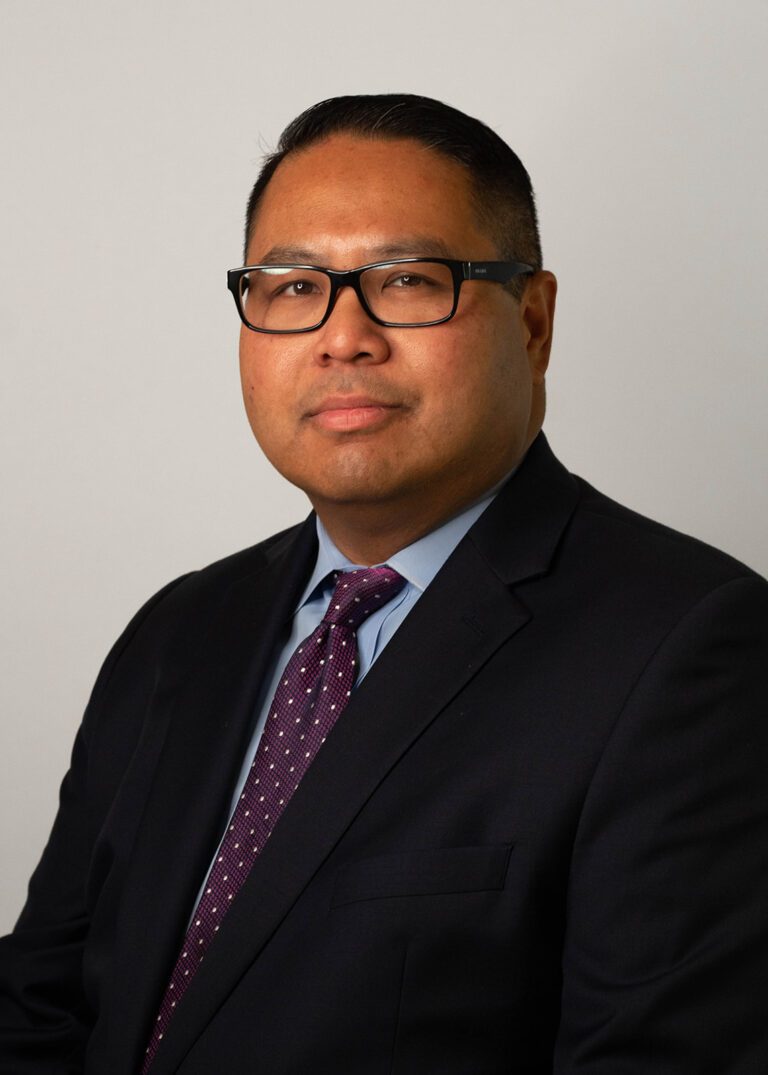 Oliver Tomas, a California real estate and business attorney at Lubin Pham + Caplin LLP.